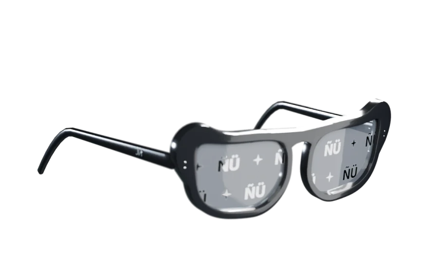 The ñü print frame in black with the ÑÜ mirror print on brown gradient lenses